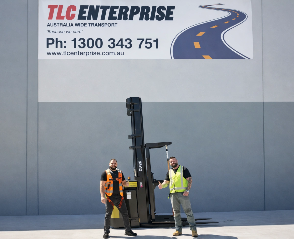 TLC Enterprise team members standing with forklift in front of transport warehouse signage