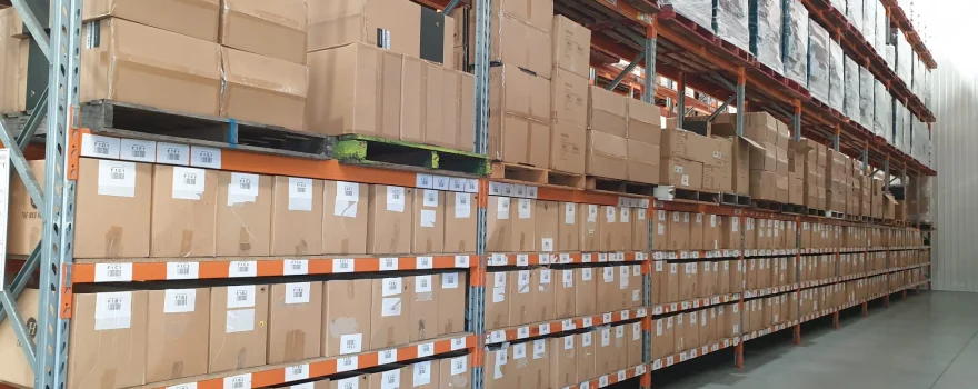 Pick and pack warehouse with organised inventory and cartons