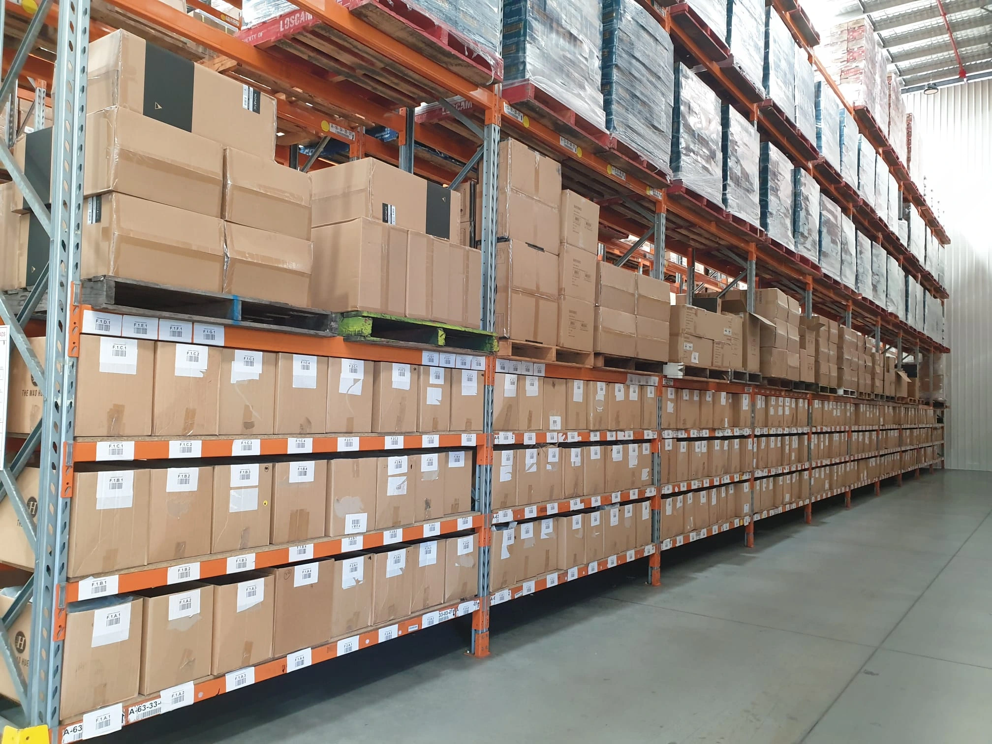 Pick and pack warehouse with organised inventory and cartons